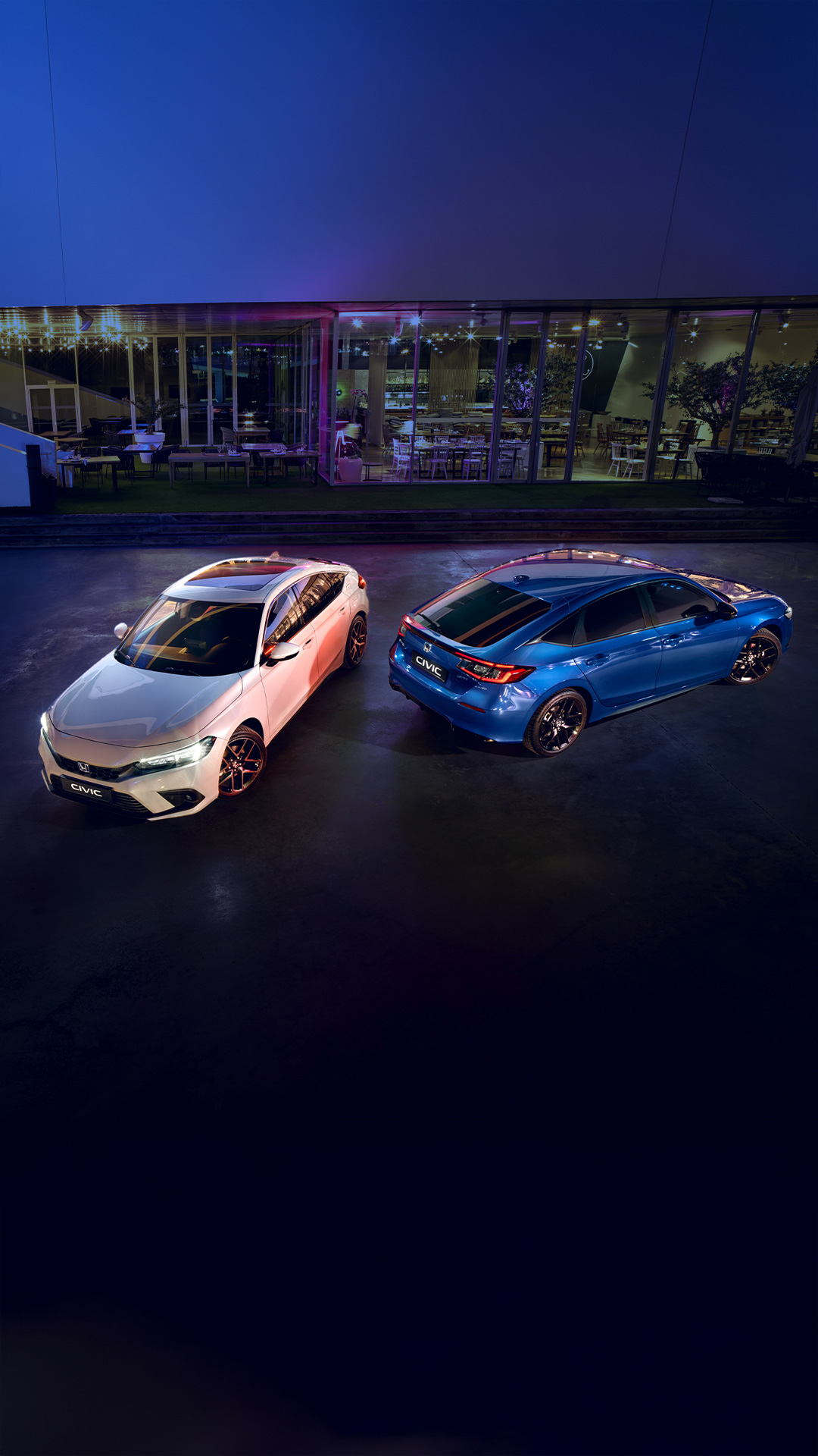 Nouvelle Honda Civic berline expos&eacute;e de nuit &ndash; Garage Majestic SA, concessionnaire Honda &agrave; La Tour-de-Tr&ecirc;me, canton de Fribourg